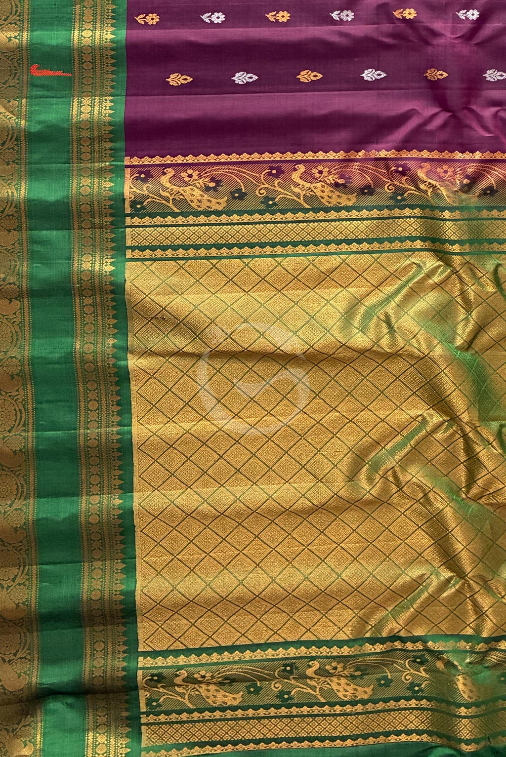 Gadwal Grape Purple buttas with self green munia border handloom silk saree