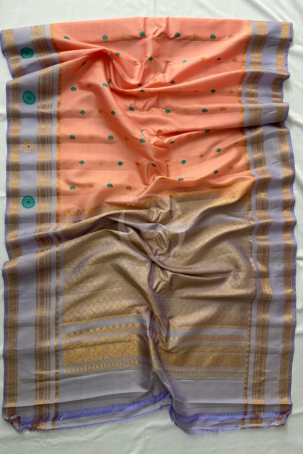 Gadwal Mustard peach, green buttas with grey butta gap border handloom silk saree