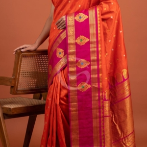 Gadwal Orange Gold Silver jari buttas with butta gap border handloom silk saree