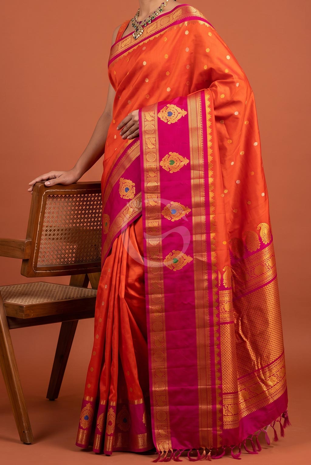 Gadwal Orange Gold Silver jari buttas with butta gap border handloom silk saree