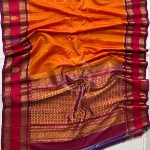 Gadwal Peach Orange Jari buttas with redish meganta butta gap border handloom silk saree