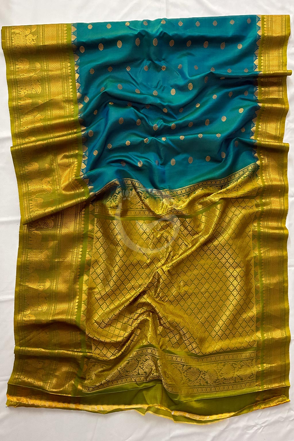 Gadwal aqua green buttas with self mehendi green border handloom silk saree