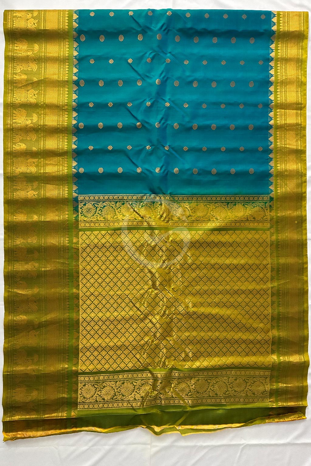 Gadwal aqua green buttas with self mehendi green border handloom silk saree