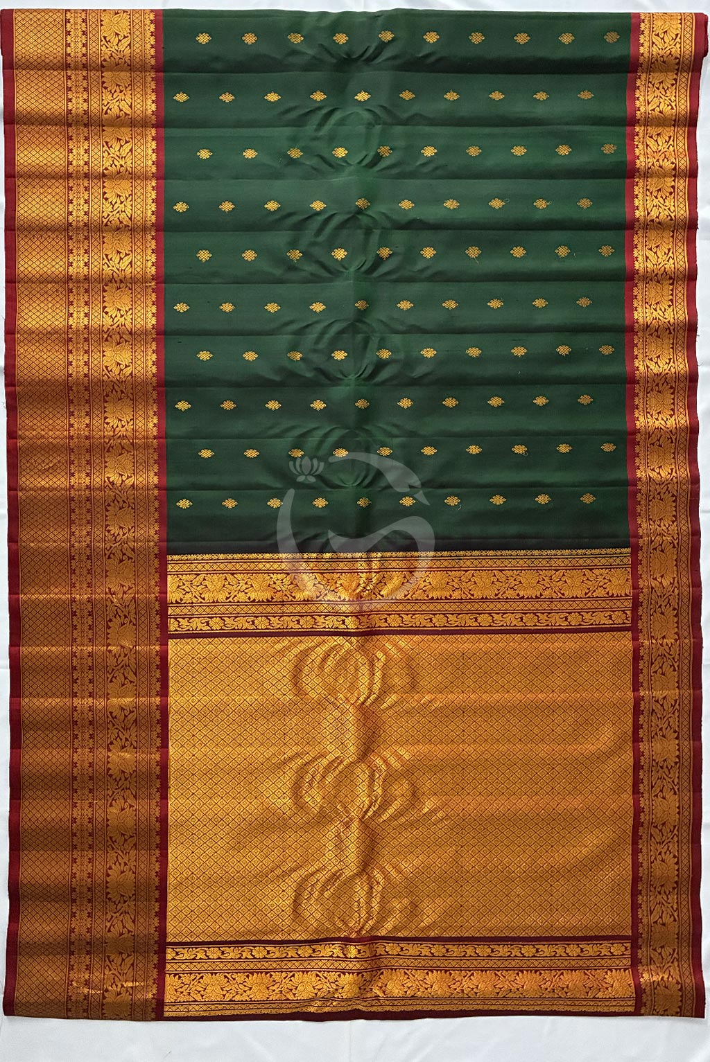Gadwal bottle green buttas with red big border handloom silk saree