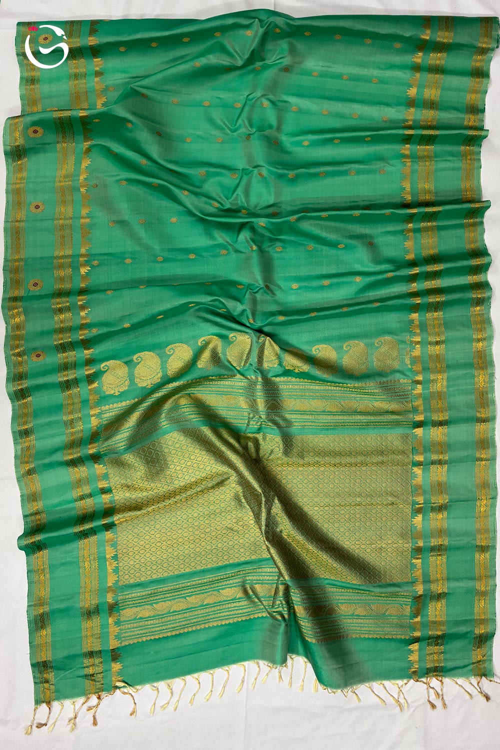Gadwal Pure Peach Green Butta body with Self small butta border handloom silk saree